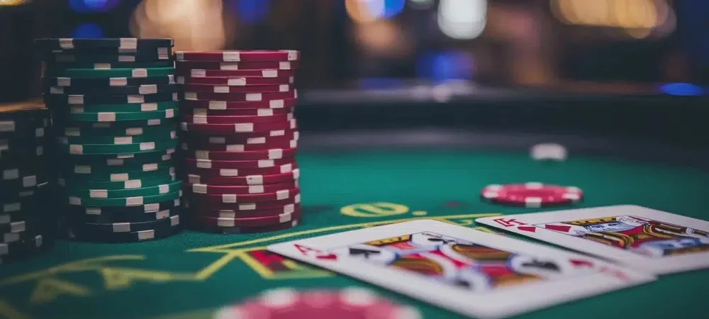 Confident player at a luxurious roulette table in a sophisticated setting — the distinctive 8JJBET premium feel for BD.
