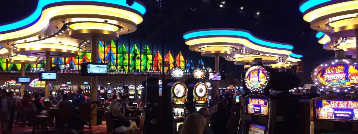 Modern slot screen glowing with lucky symbols and golden coin animations on a sleek dark theme.